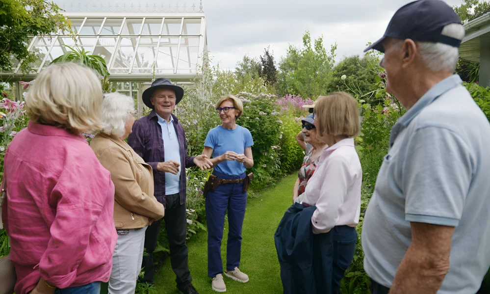 Happy guest with Nuala and Conall at Ardán Garden
