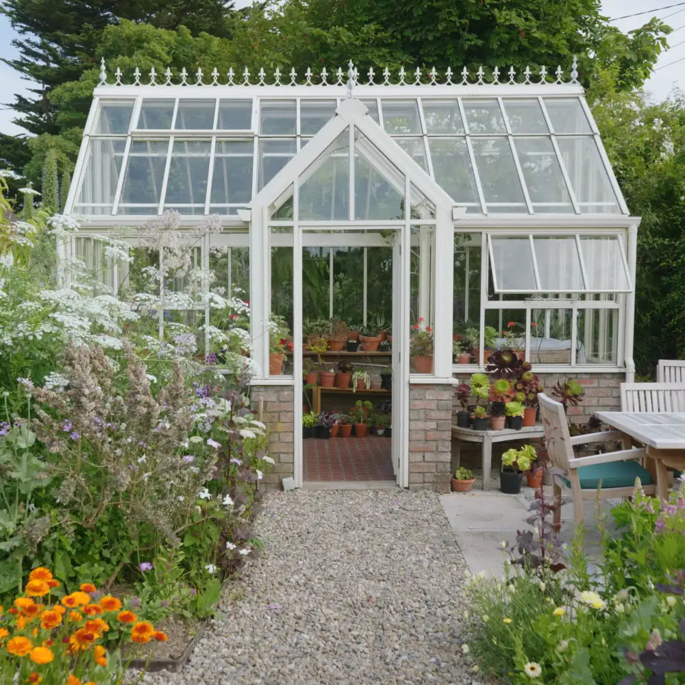 Glasshouse sitting area at Ardán Garden